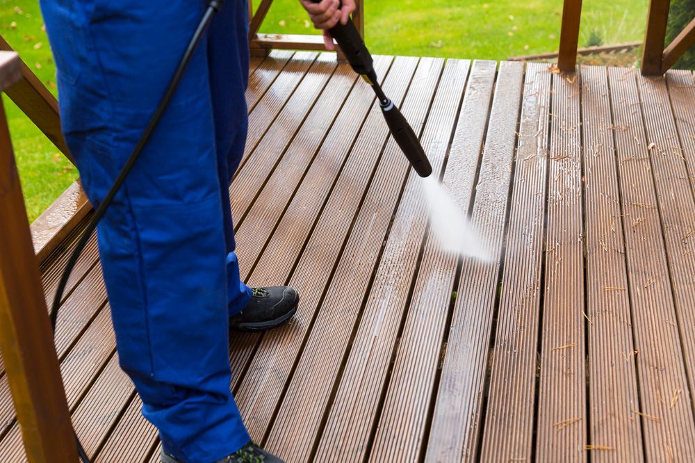 Professional pressure cleaning of outdoor wooden deck