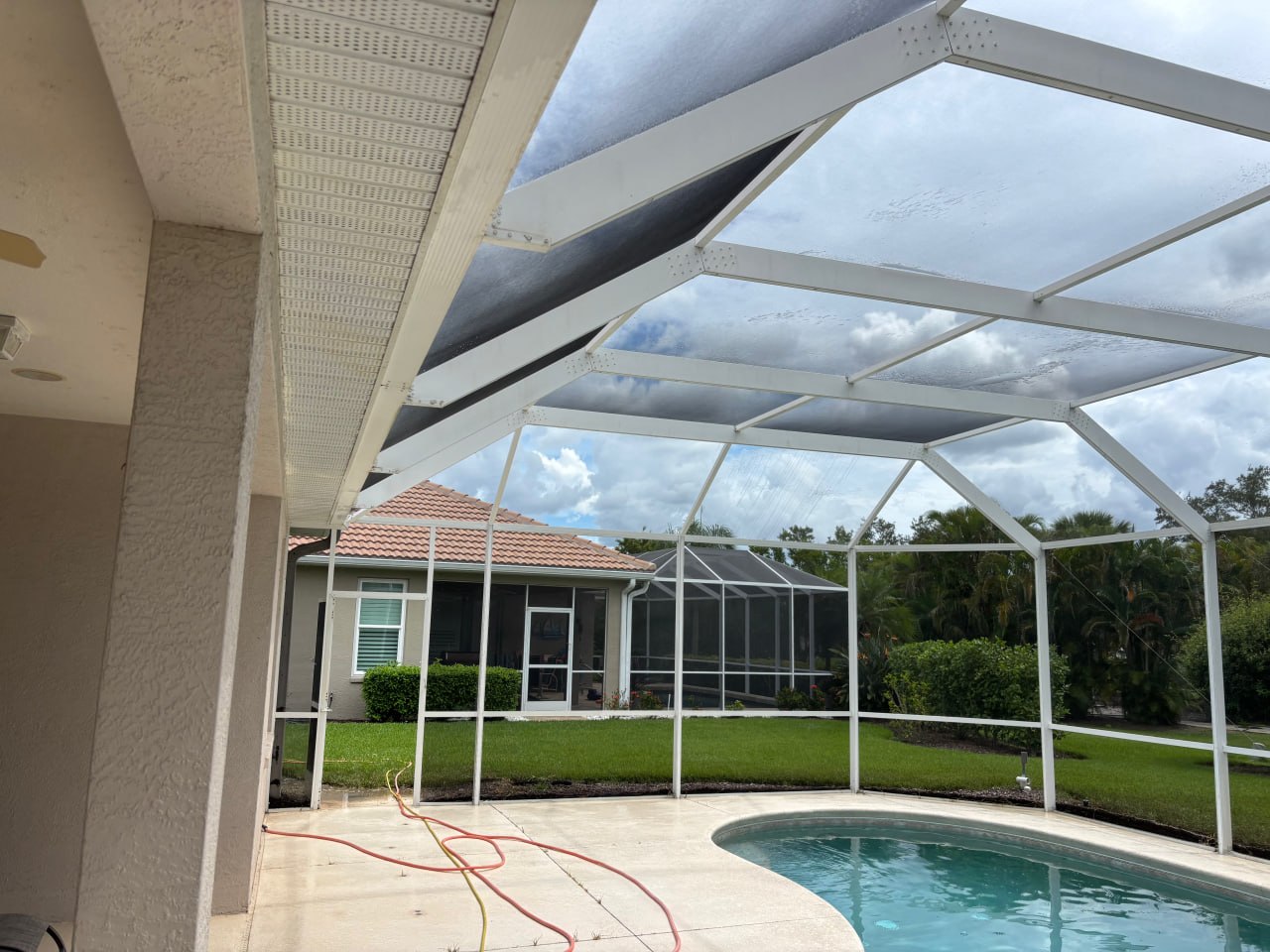 Pool cage cleaning and exterior house cleaning